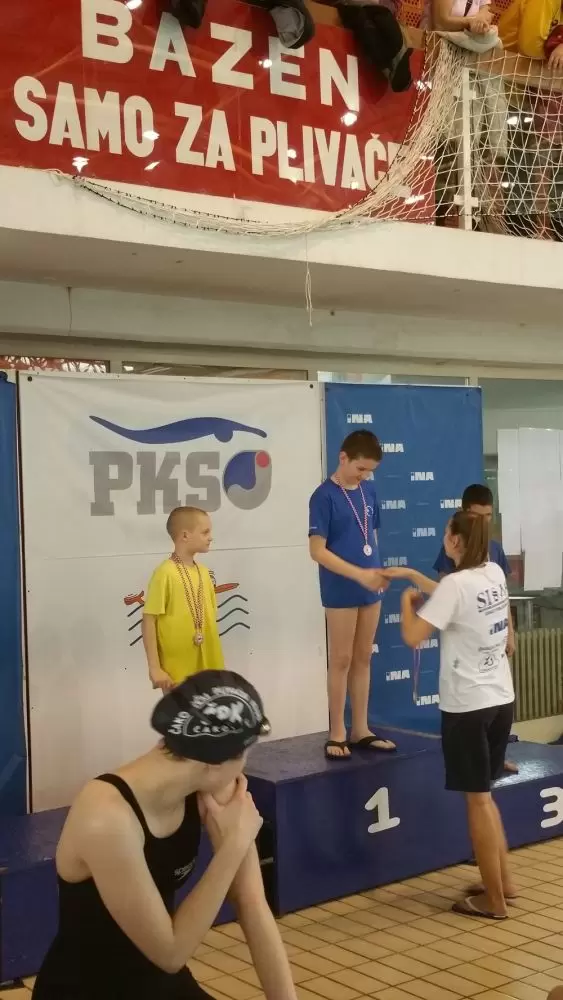 Prvak regije na 50m delfin